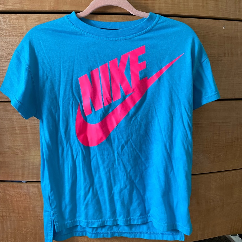 Worn a few times. It will come washed and ironed.